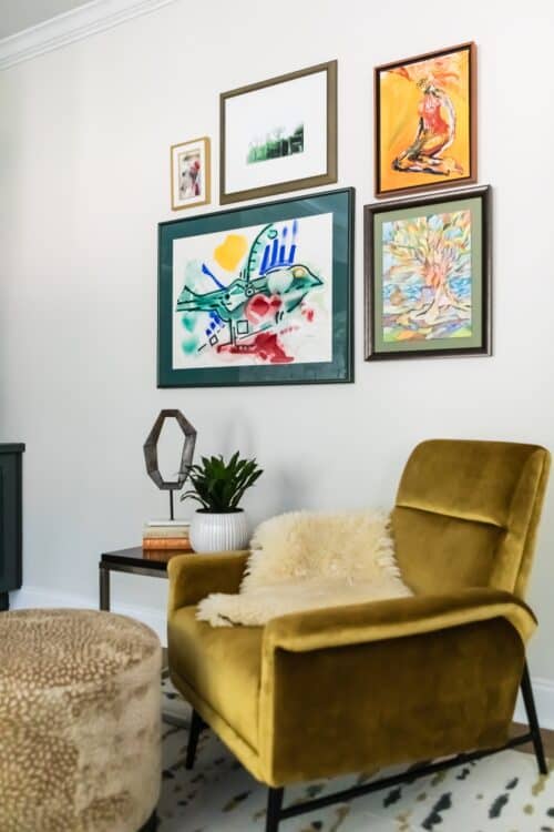 reading nook yellow velvet chair ottoman sheepskin potted plant art collection interior design LK Design