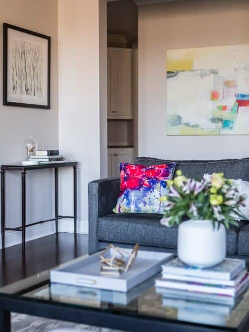 LK Design interior design living room art decor accessories white gray rug glass coffee-table
