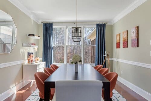 interior design dining room orange chairs blue curtains modern table lk design Durham NC
