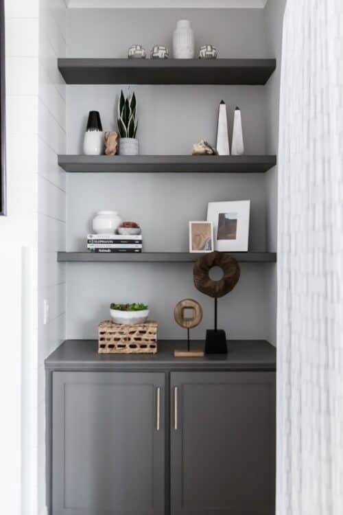 monochromatic family room grey open shelves white decor frames lk design durham nc