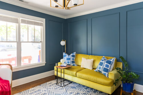 LK Design Durham colorful guest bedroom blue walls yellow sofa patterned rug
