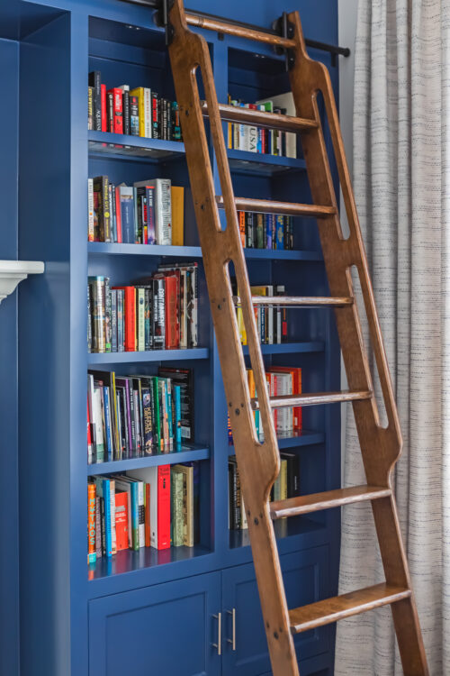 LK Design Home library blue shelves ladder