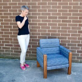 Laura Koshel with old UNC blue chair to be reupholstered by LK Design